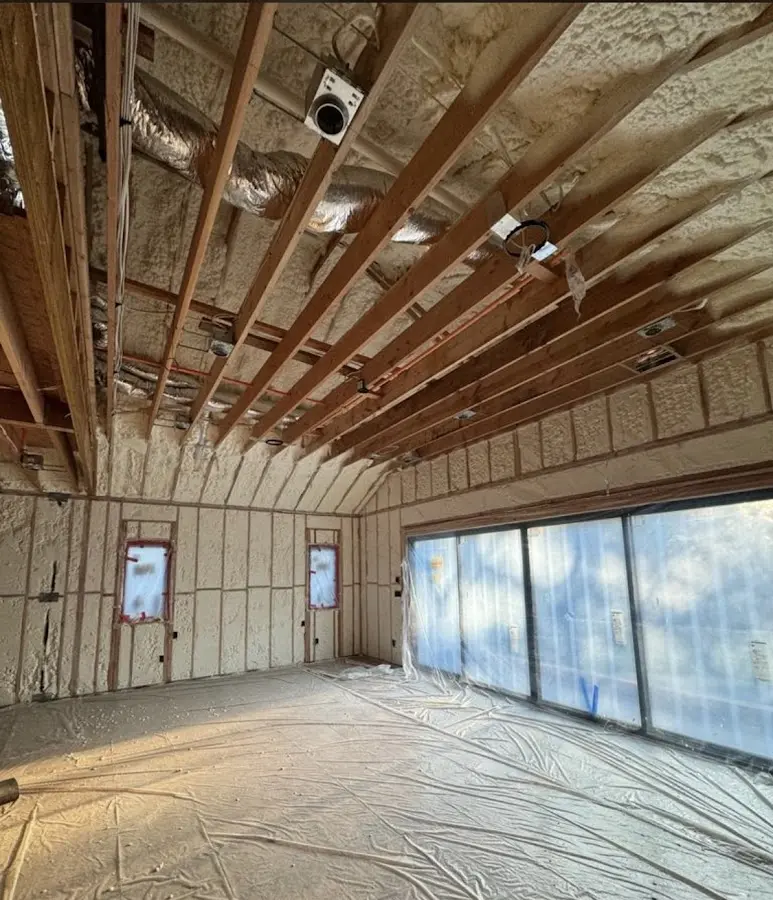 Interior walls and ceiling insulated with spray foam during new construction in West Rancho Dominguez